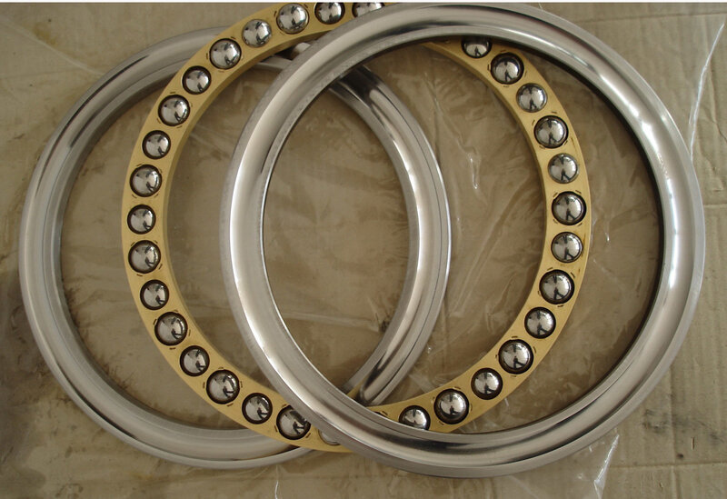 two ball bearings on cardboard