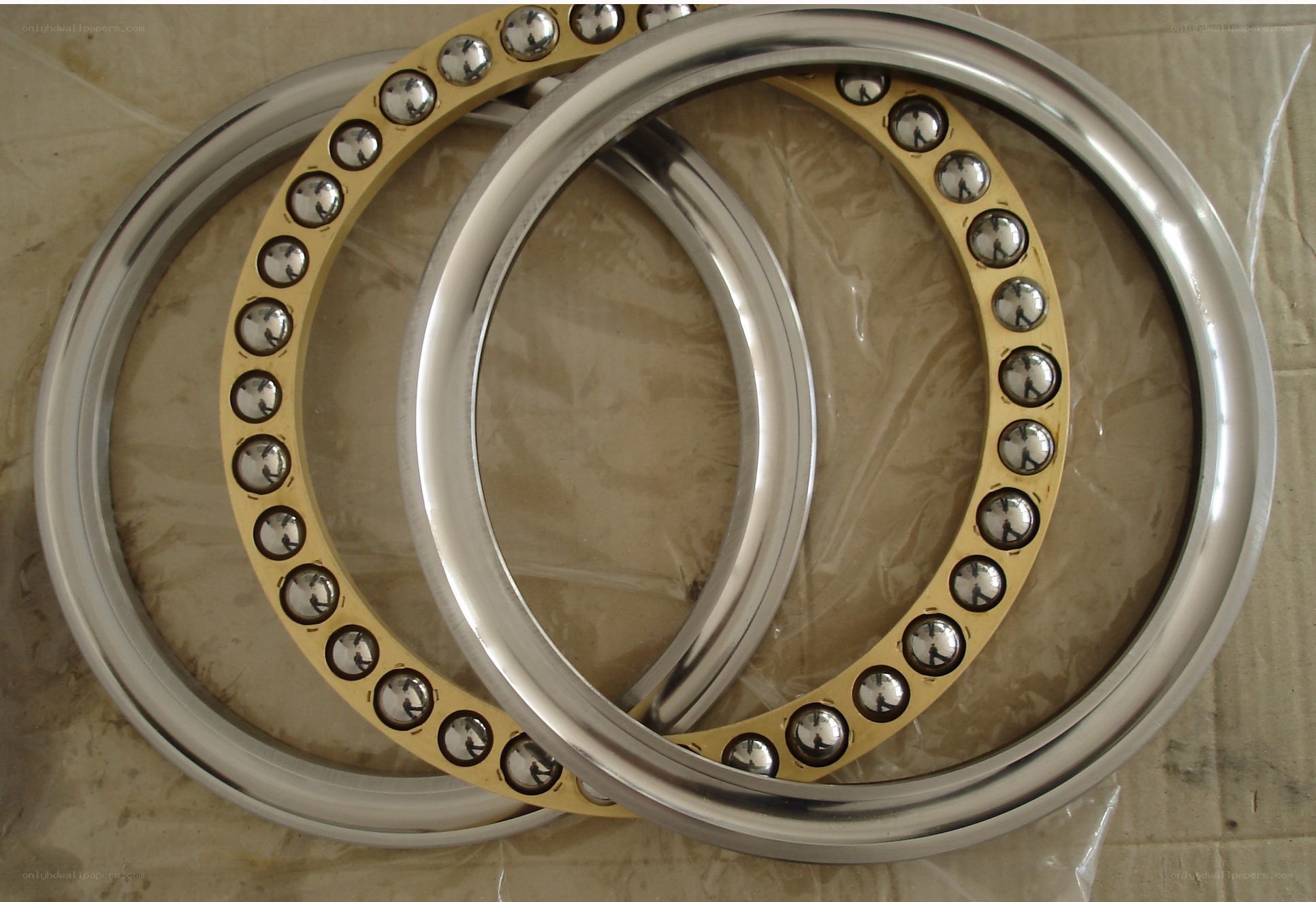 two ball bearings on cardboard