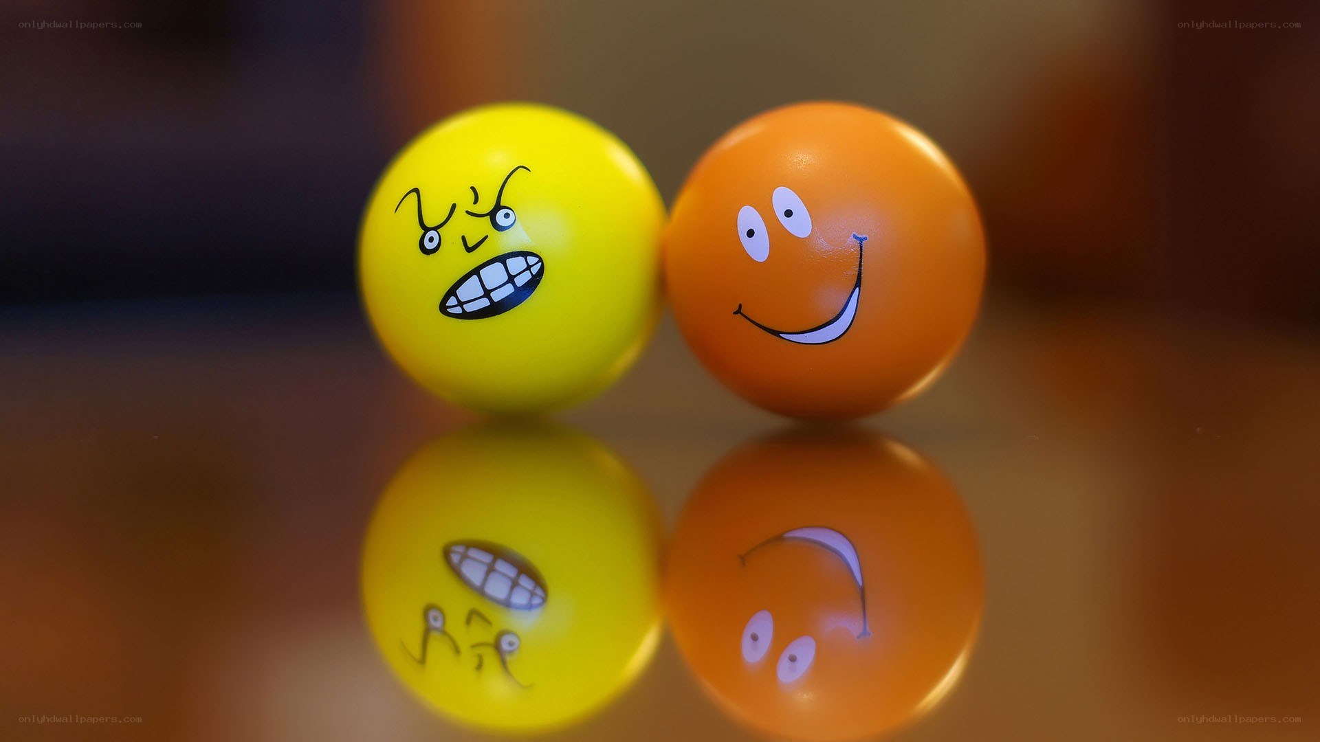 Two balls with faces