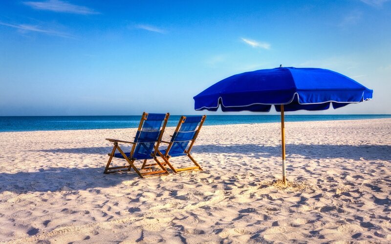 Two Beach Chairs and Umbrella