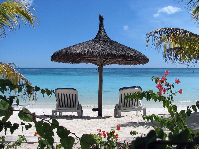 Two Beach Chairs under Umbrella