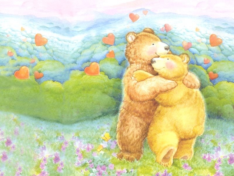 Two bears hugging in a field