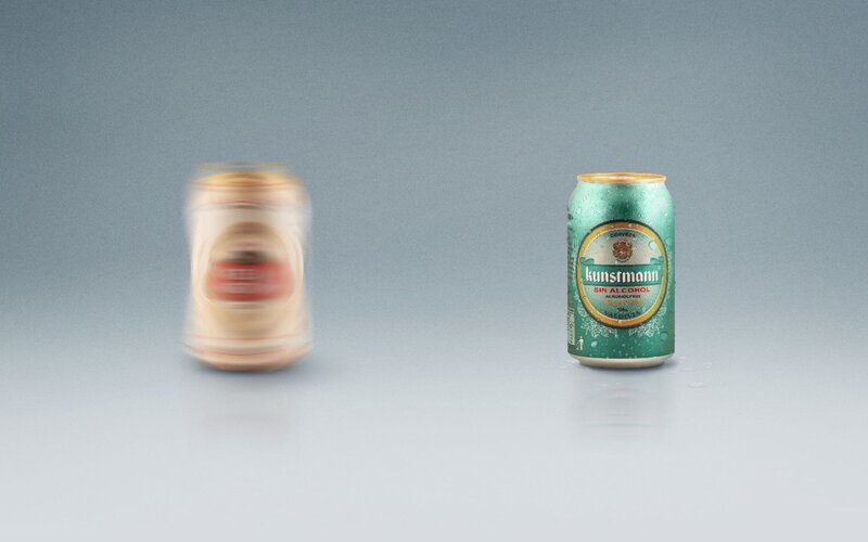 Two beer cans on a surface