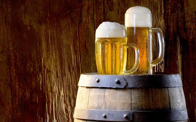 Two Beer Mugs on Barrel — Brown