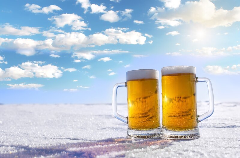 Two Beer Mugs on Snow