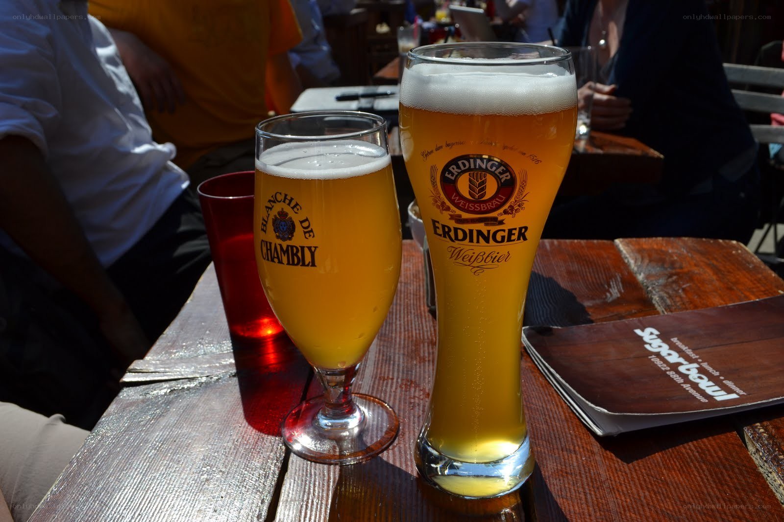 Two beers on a wooden table