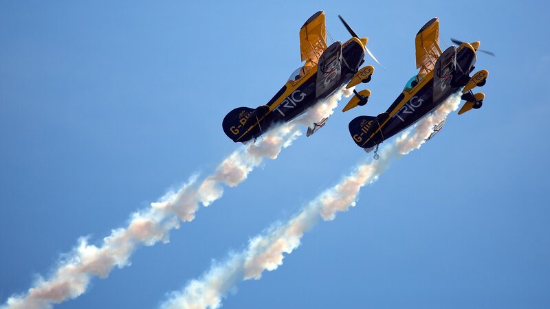 Two Biplanes Flying — Blue