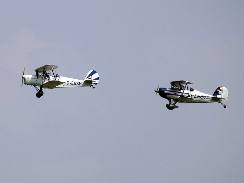 Two biplanes in flight