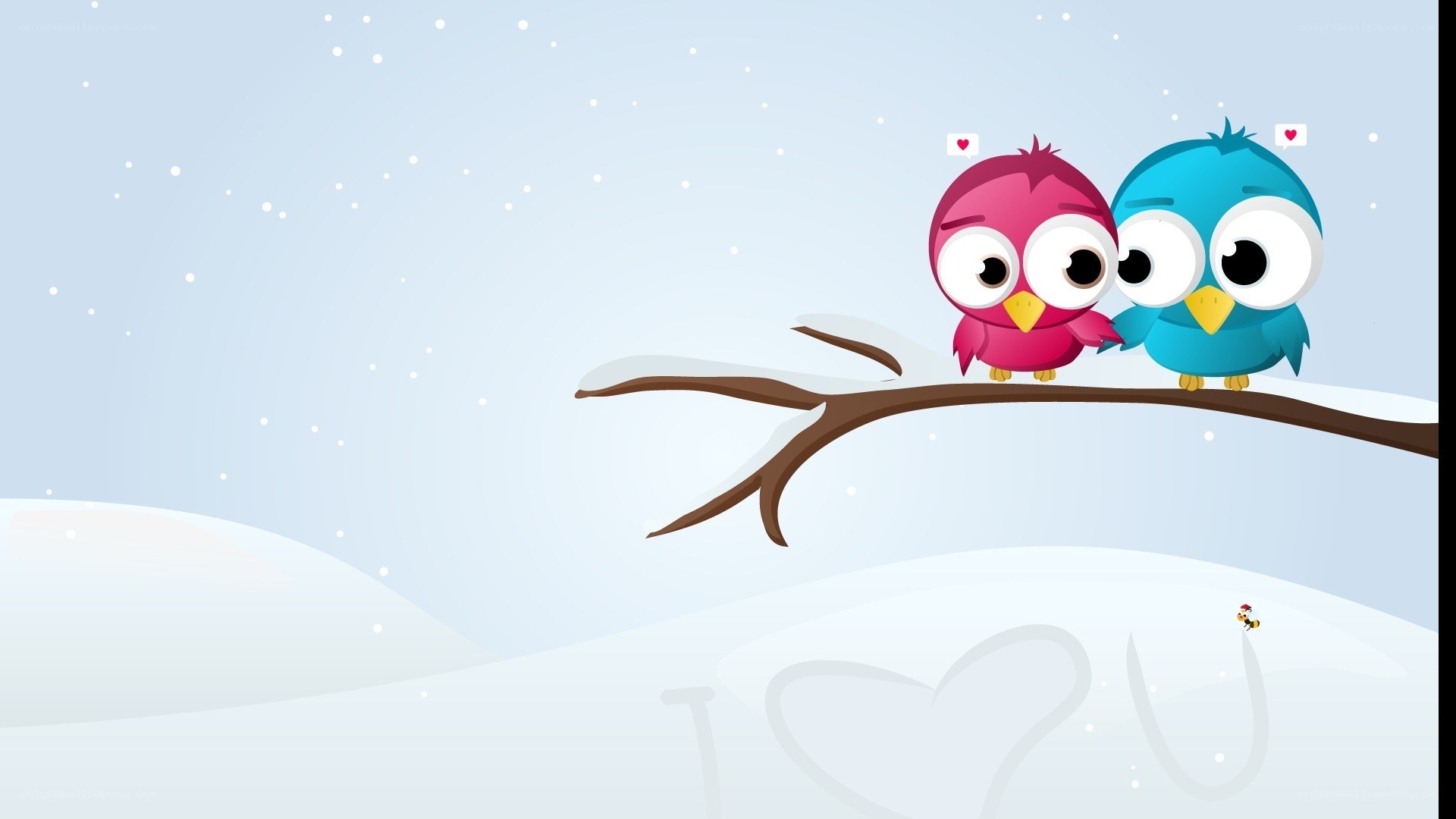 two birds on a snowy branch