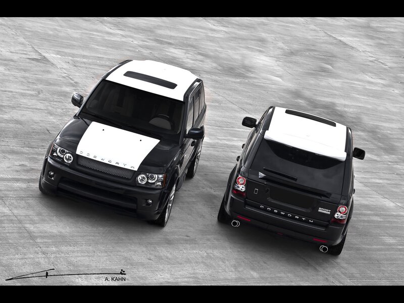 Two black and white Range Rovers