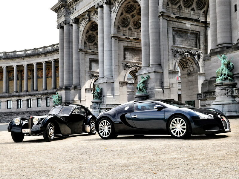 Two Black Bugatti Cars