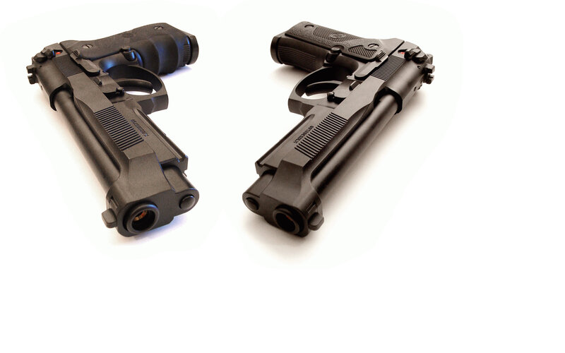 two black handguns