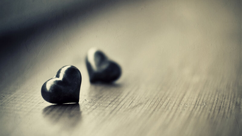 Two Black Heart Shapes — Somber