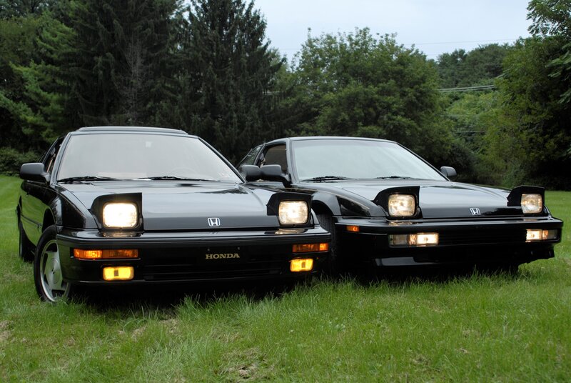 Two Black Honda Cars