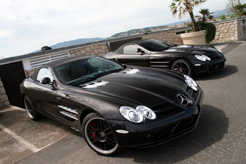 Two black Mercedes SLR cars