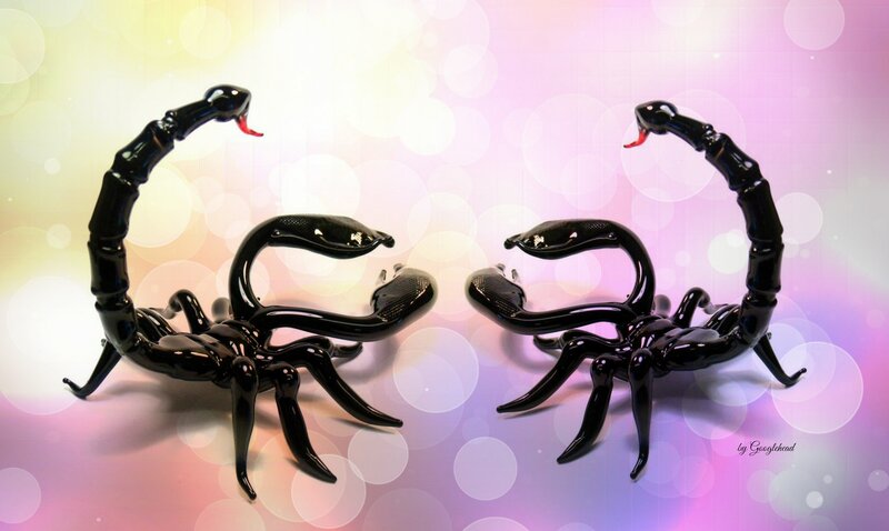 Two Black Scorpion Figurines