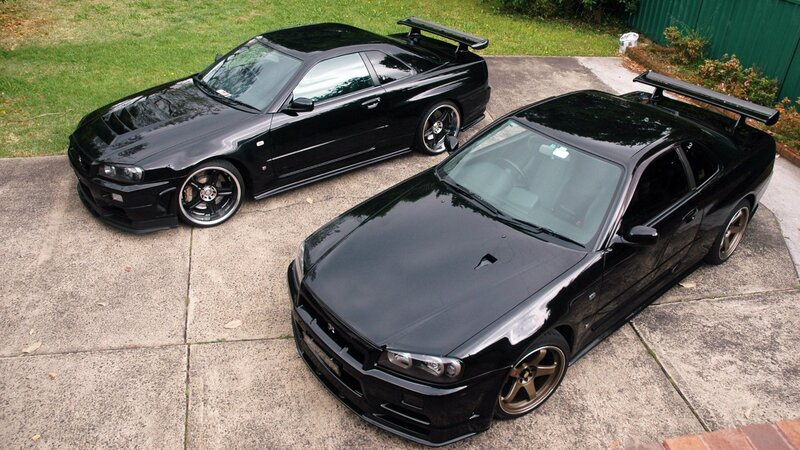 Two Black Sports Cars — Calm, Afternoon