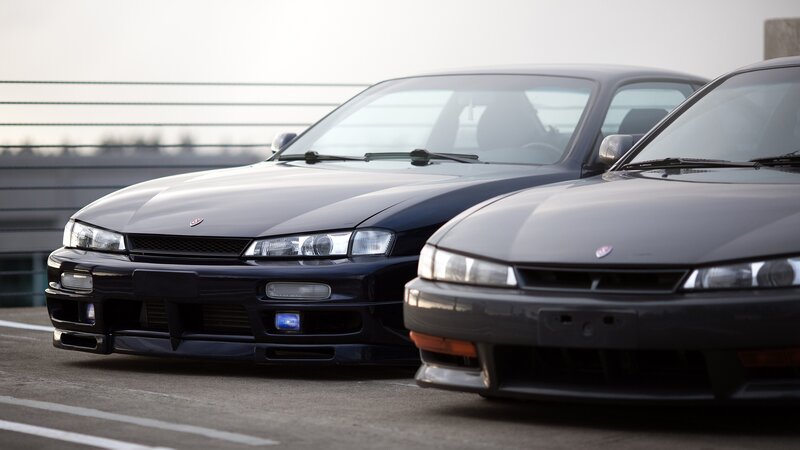Two Black Sports Cars — Calm, Morning