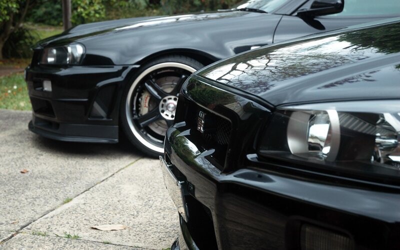 Two Black Sports Cars — Calm