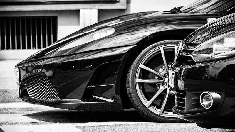 Two Black Sports Cars — Dramatic, Photograph, Wheel