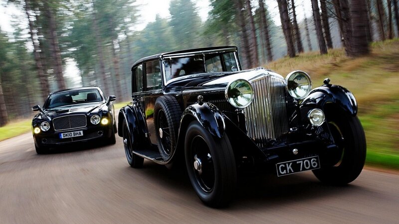 Two Black Vintage Cars
