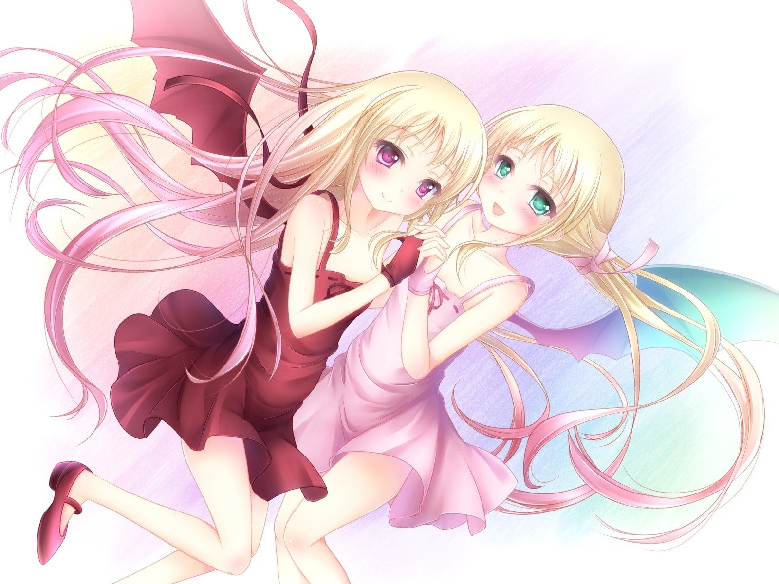 Two blonde girls in dresses