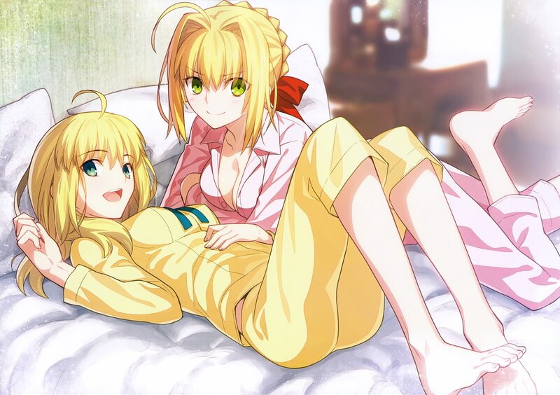 Two Blonde Girls on Bed