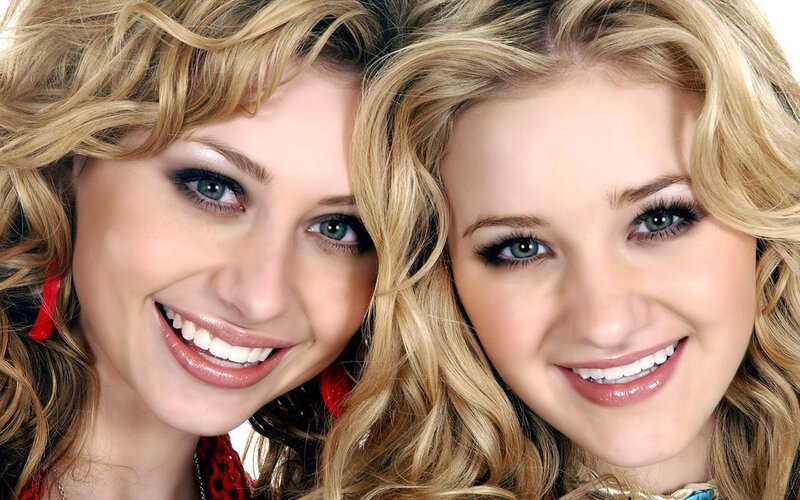 Two Blonde Women Smiling — Happy