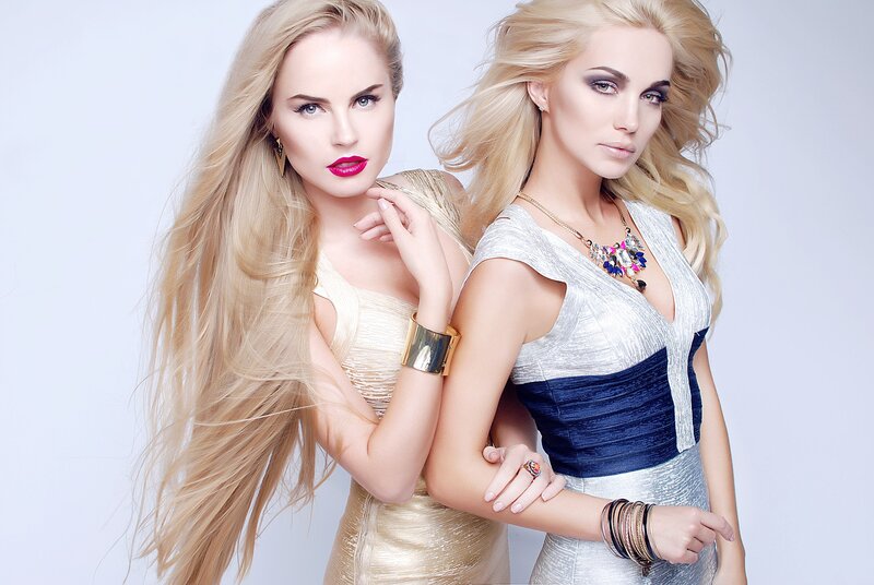 Two Blonde Women — White, Confident