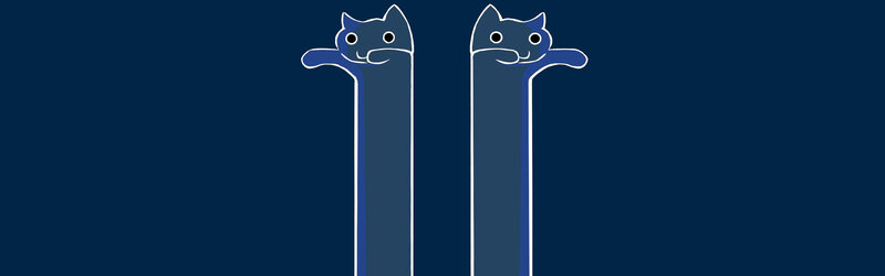 two blue cats on poles