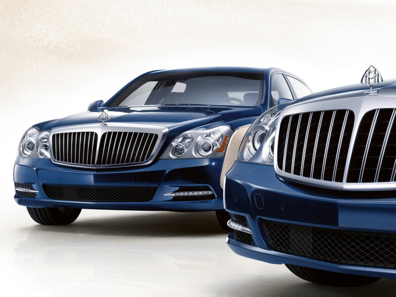 Two blue Maybach luxury cars