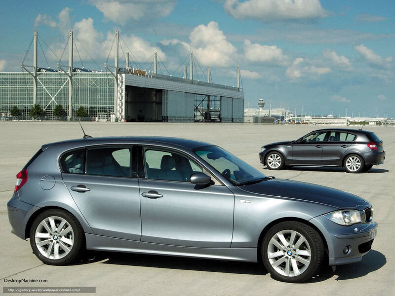 Two BMW 1 Series cars at airport