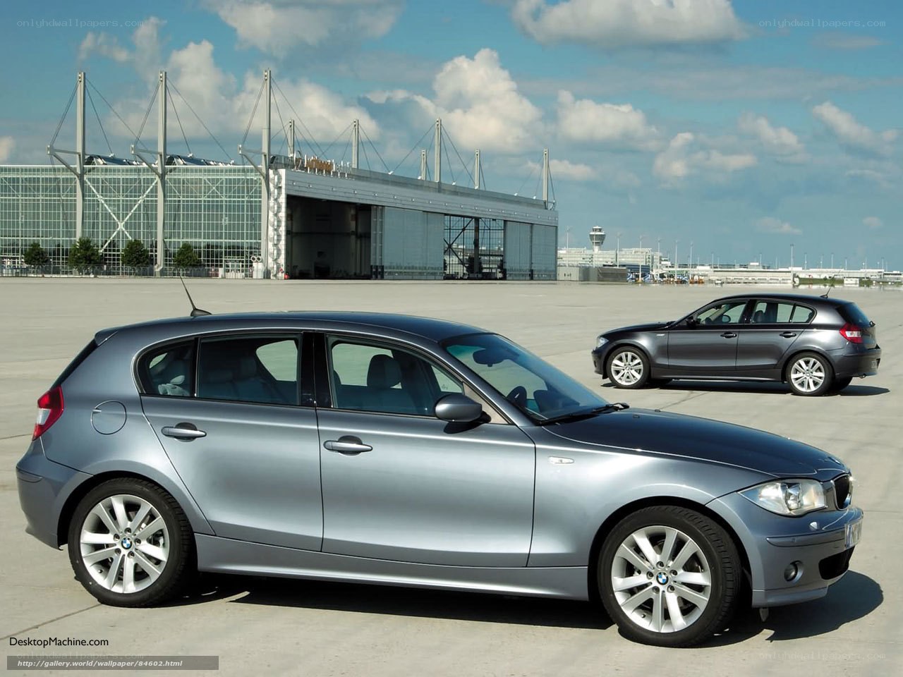 Two BMW 1 Series cars at airport