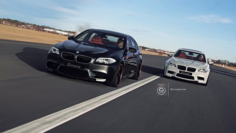 Two BMW cars on a racetrack