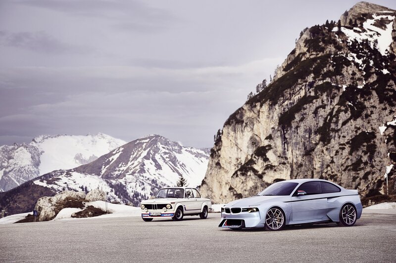 Two BMW Cars on Mountain Road