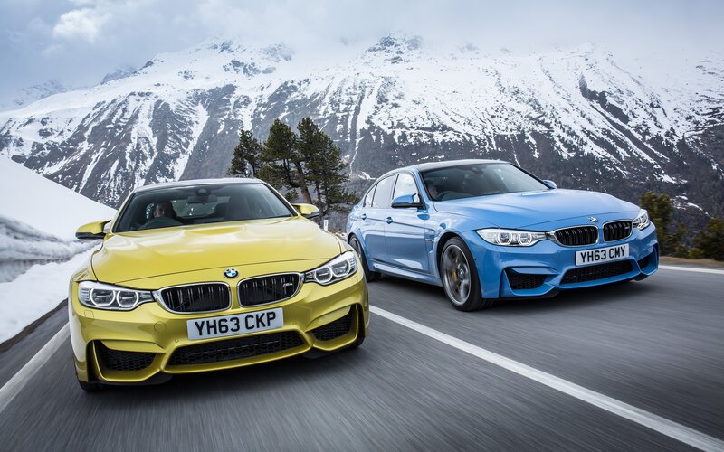 Two BMW Cars on Road — Yellow, Dynamic