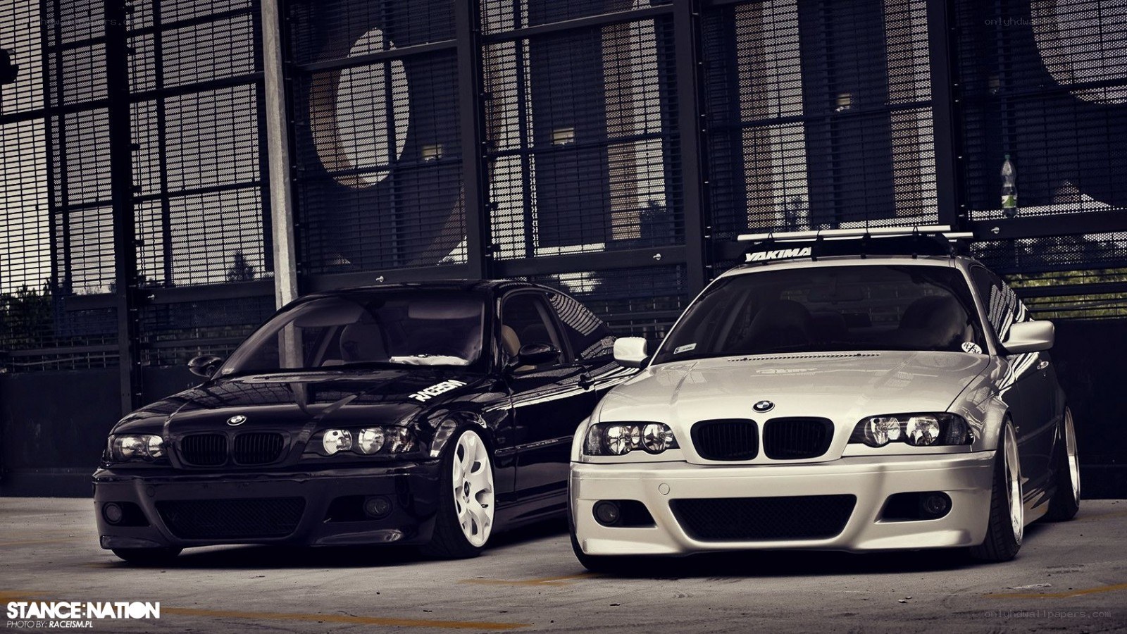 Two BMW cars parked