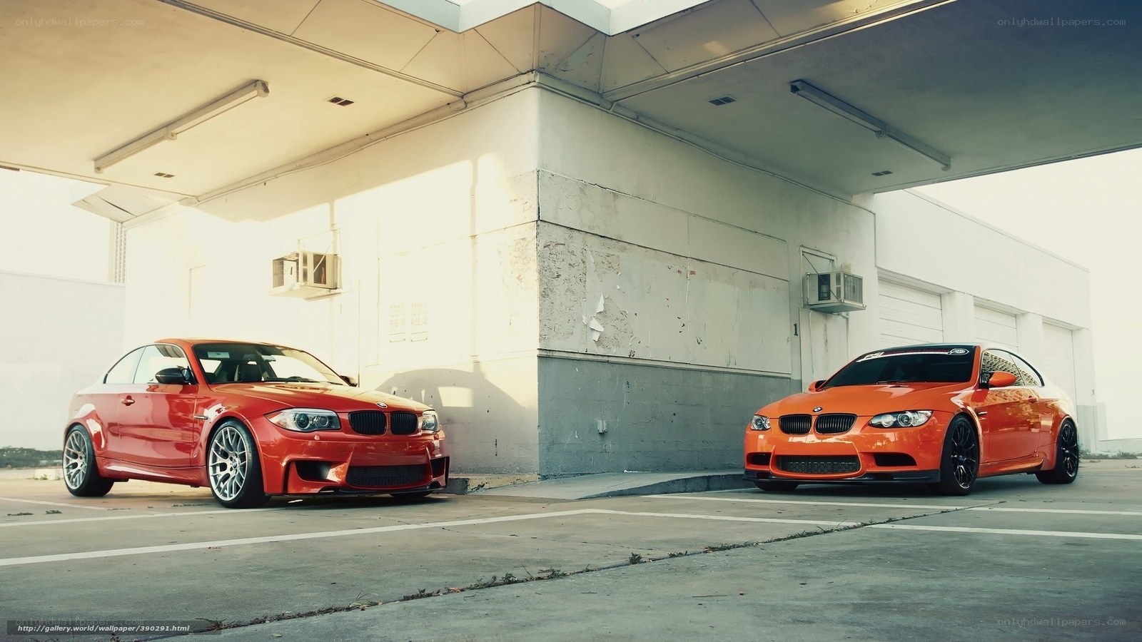 Two BMW cars parked