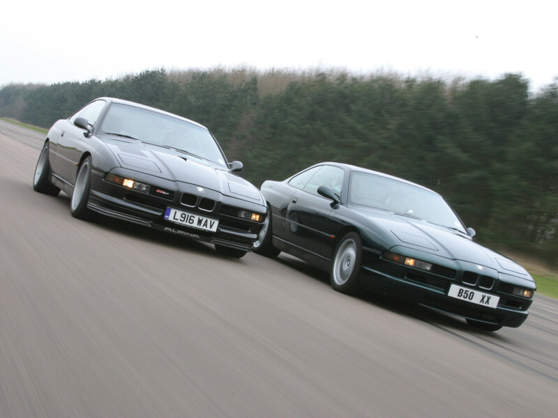 Two BMW cars racing
