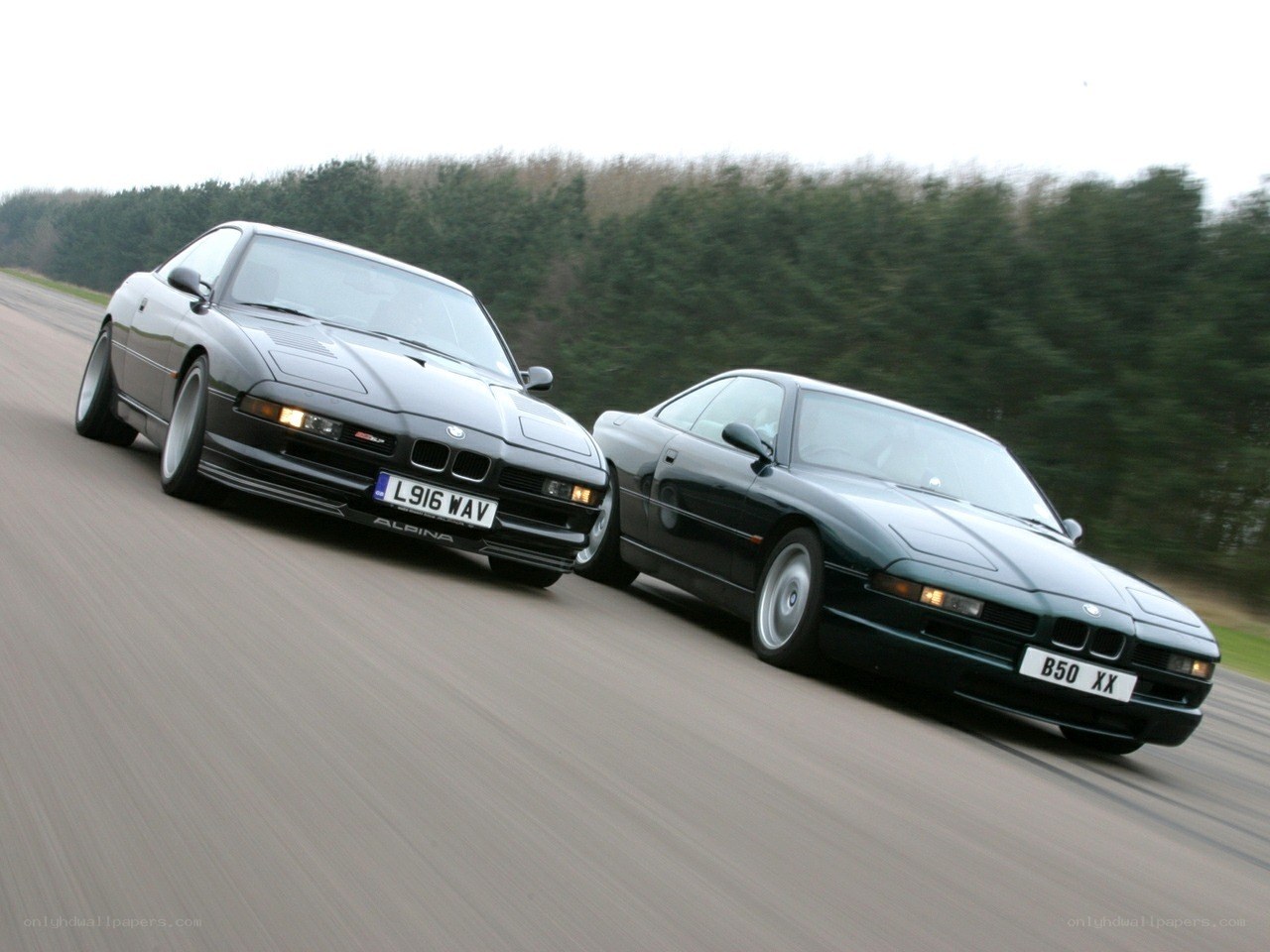 Two BMW cars racing