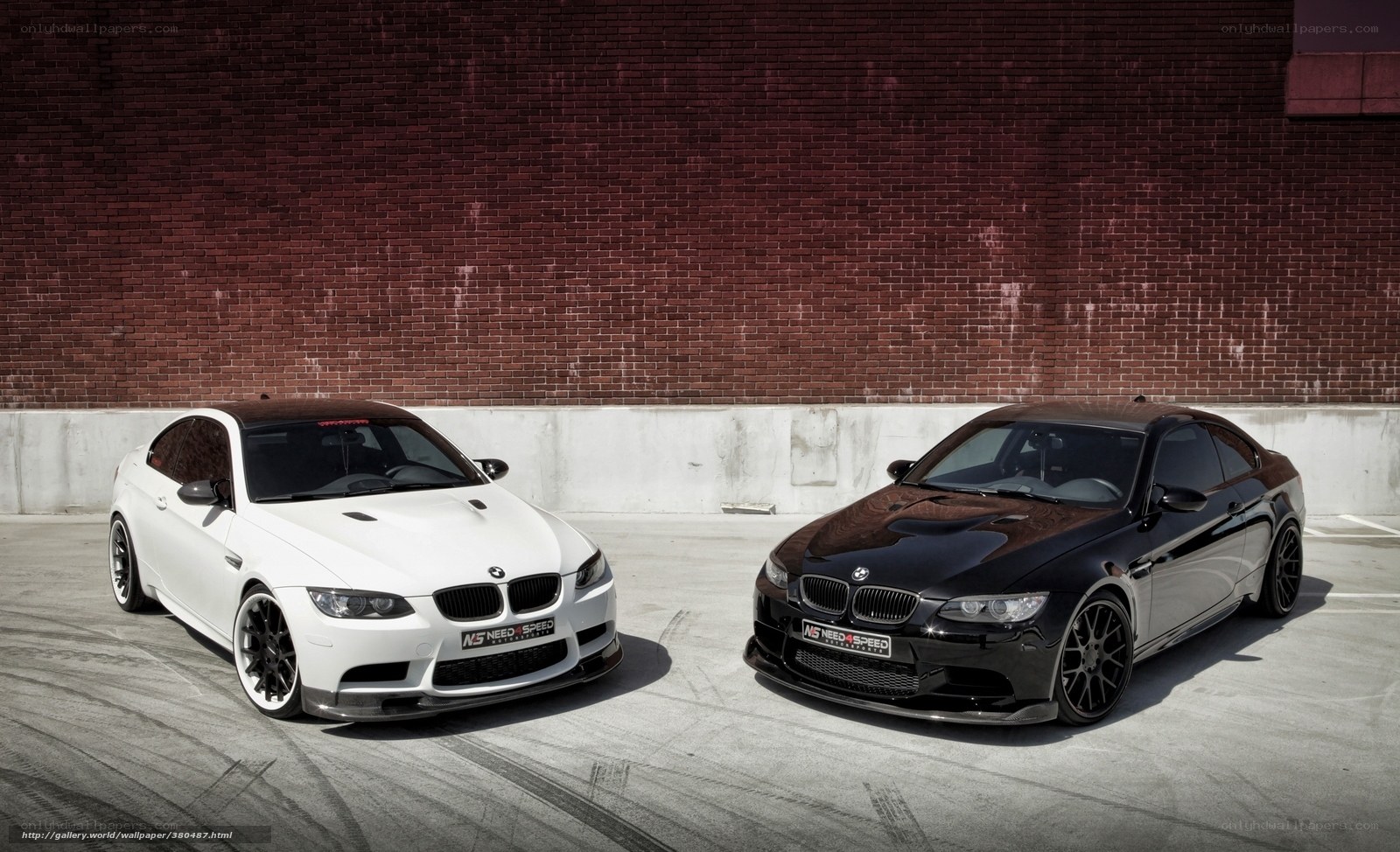 Two BMW M3 cars side by side