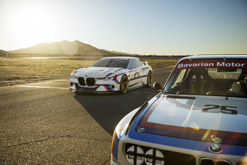 Two BMW Race Cars — White, Dramatic, Sunset