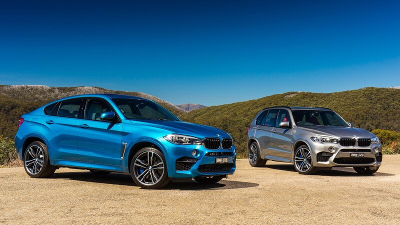 Two BMW SUVs — Blue