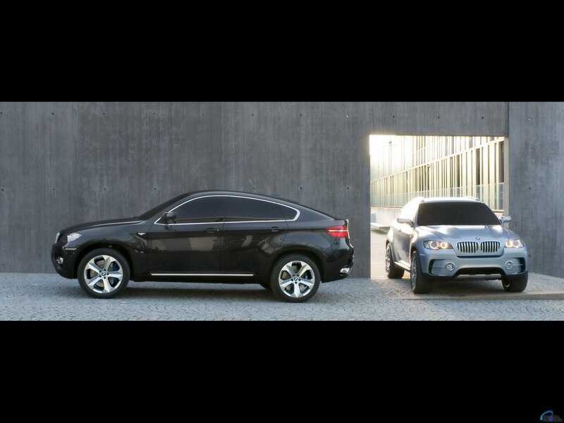 Two BMW SUVs in a modern setting