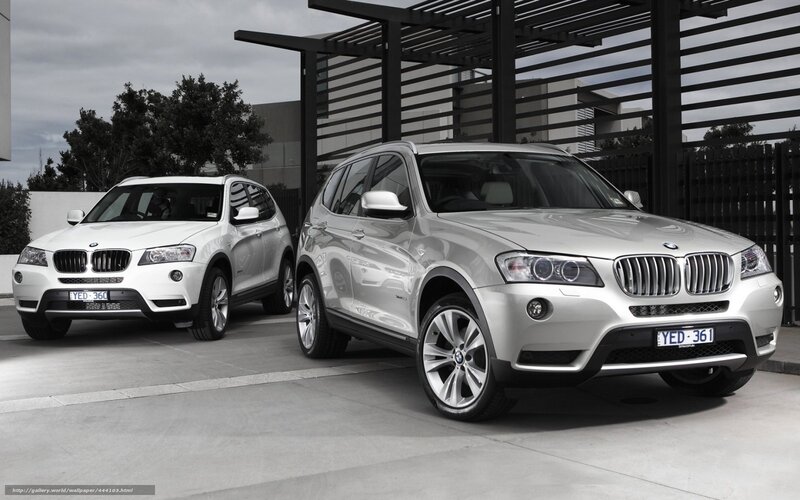 Two BMW X3 SUVs parked