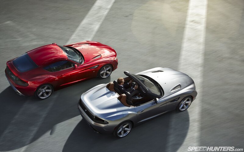 Two BMW Z4 cars on a road