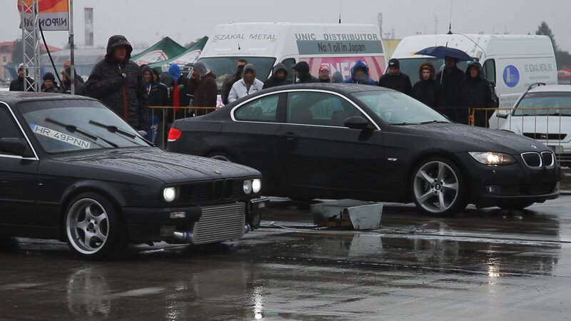 Two BMWs at a drag race