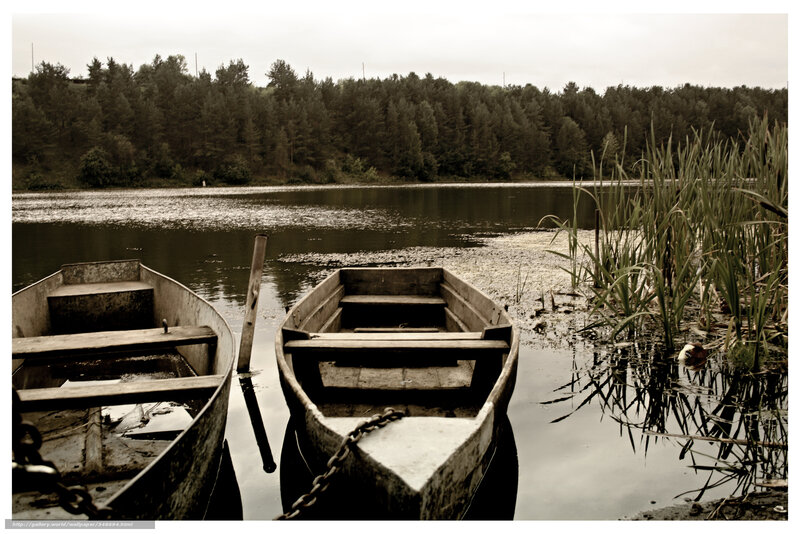 Two boats on a calm lake