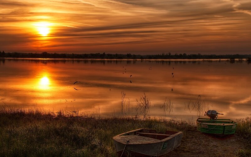 Two Boats on Lake Shore — Orange