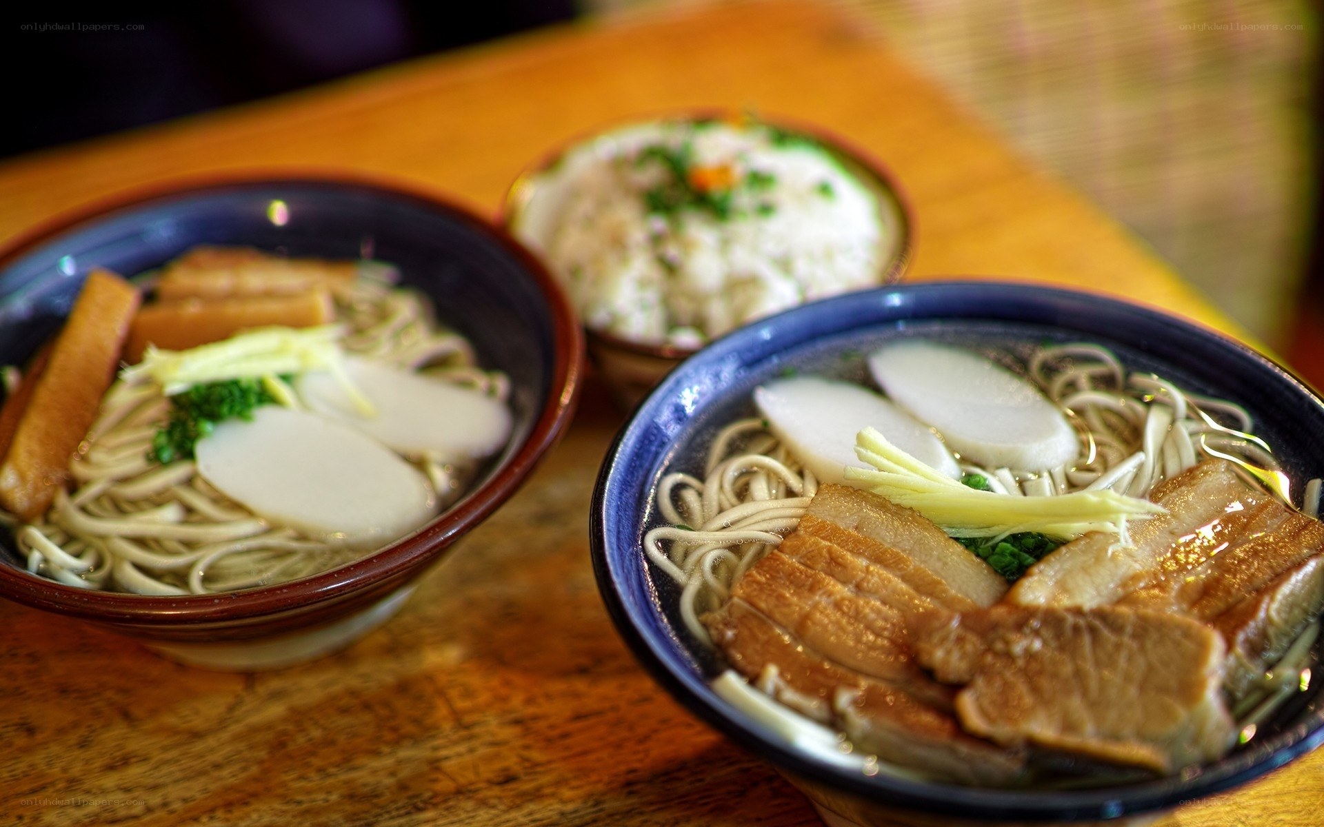 Two bowls of ramen with rice